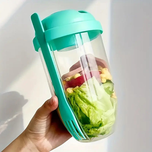 Salad container with fork and sauce cup