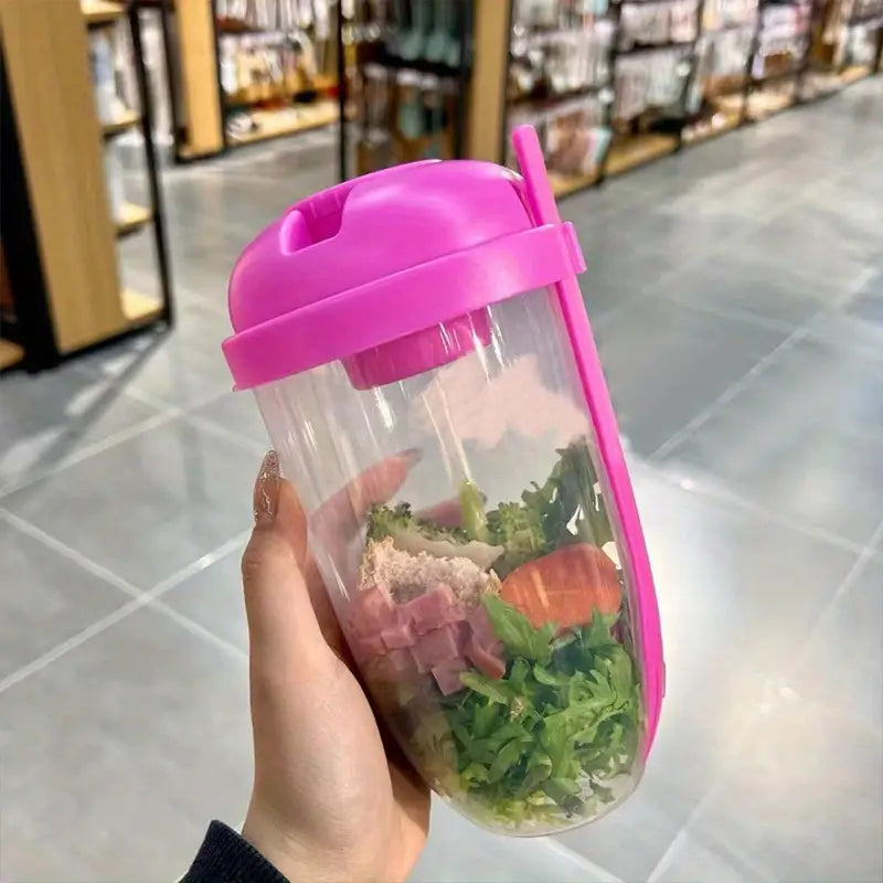 Salad container with fork and sauce cup